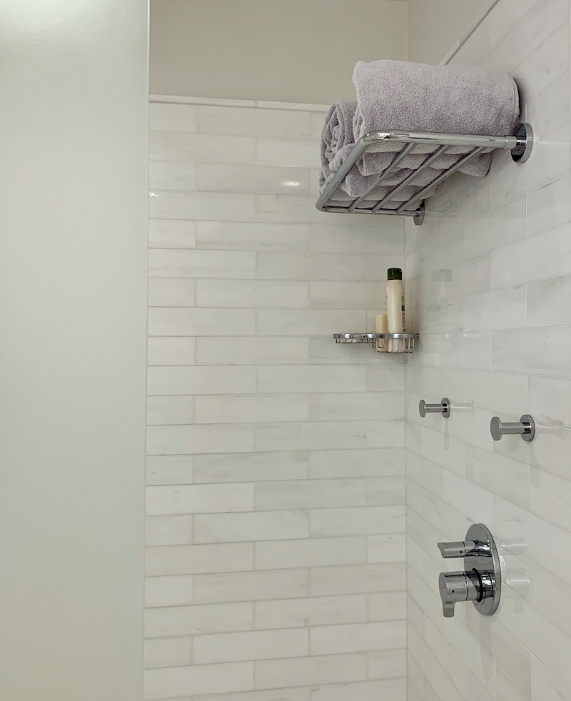 bathroom fixes - marble subway tile