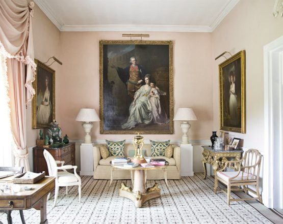 india-hicks-home-pink-living-room-old-oil-paintings