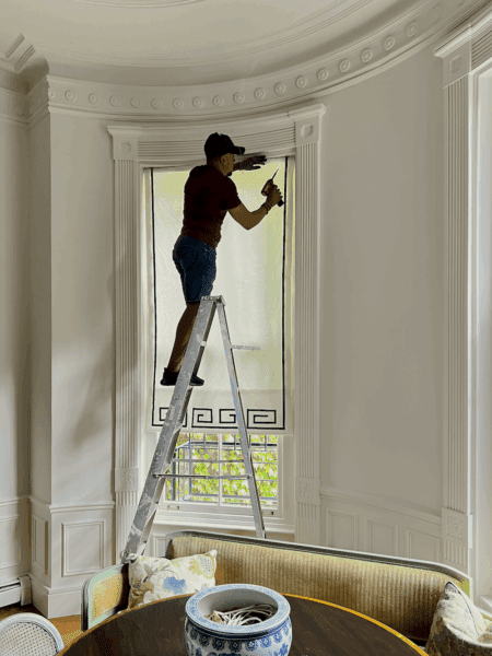 Javier installing Roman Shades July 2025