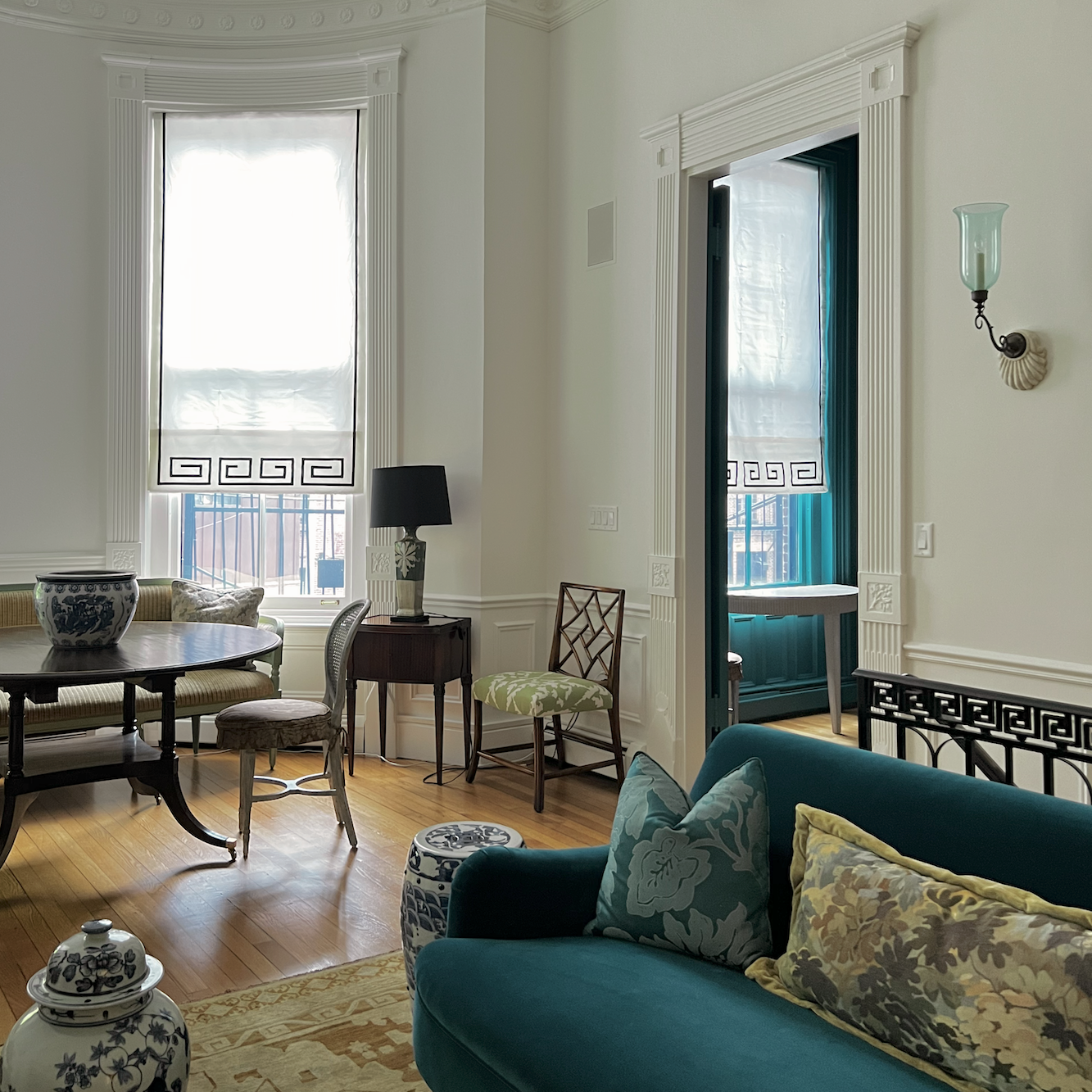 Living room Roman Shades- looking into den