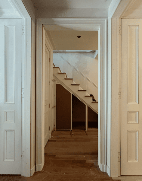 staircase with hidden doors being built