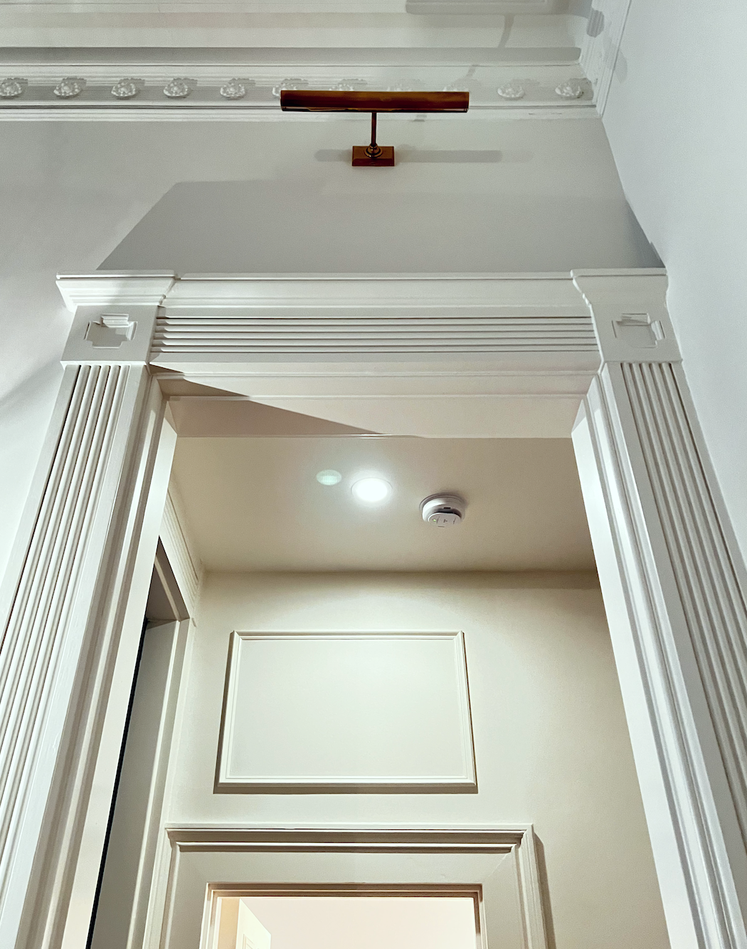 vestibule recessed light next to smoke alarm
